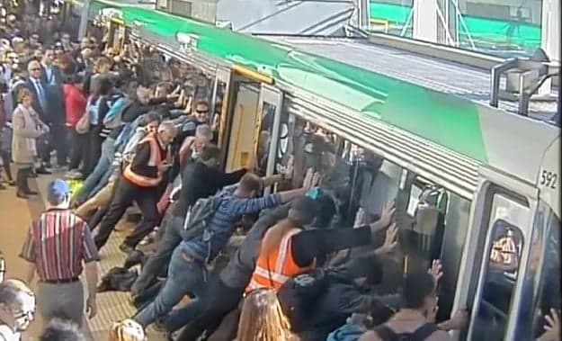VIDEO: Commuters In Australia Push Train To Free Man Trapped Against Platform VIDEO: Commuters In Australia Push Train To Free Man Trapped Against Platform