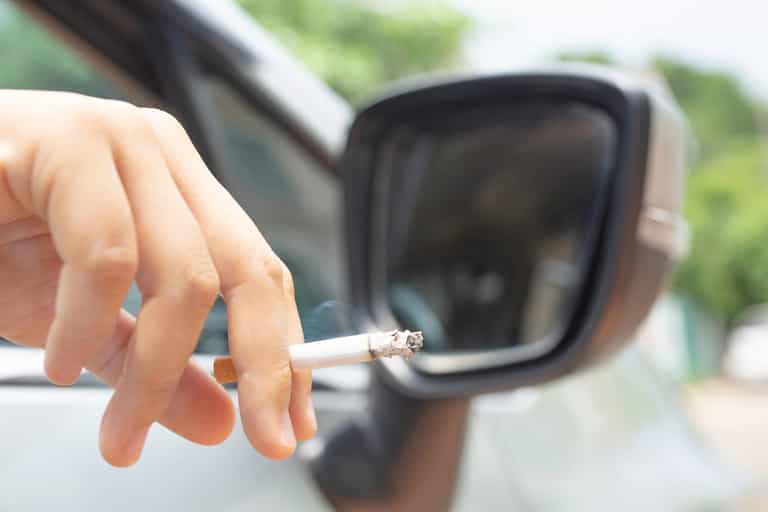 Woman fined £1,500 for flicking cigarette from car window in London Woman fined £1,500 for flicking cigarette from car window in London