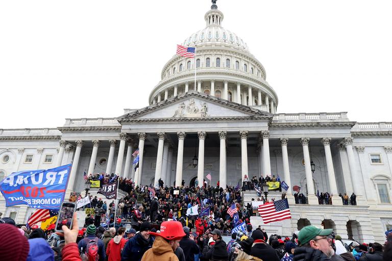 Two photos of Capitol building 1,448 days apart encapsulate horror of Trump presidency Two photos of Capitol building 1,448 days apart encapsulate horror of Trump presidency