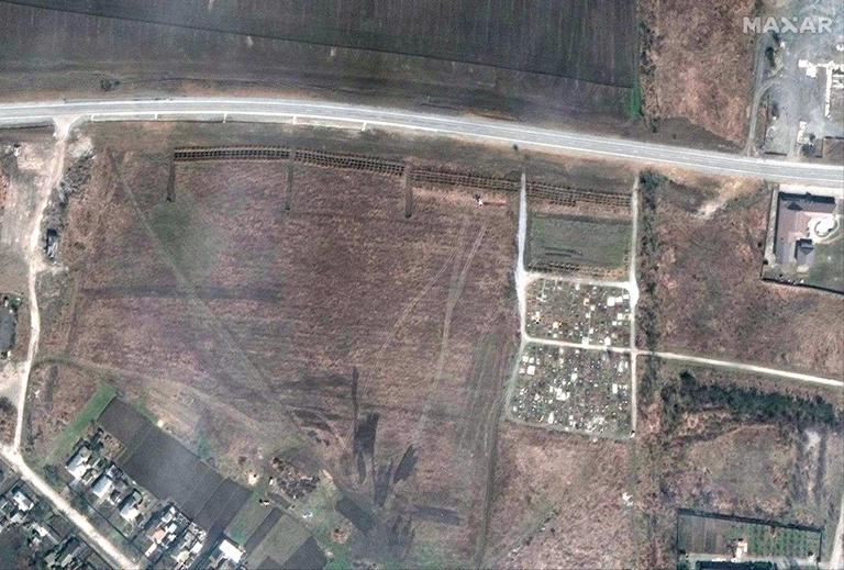 New images show possible mass graves outside Mariupol as Russian siege continues New images show possible mass graves outside Mariupol as Russian siege continues