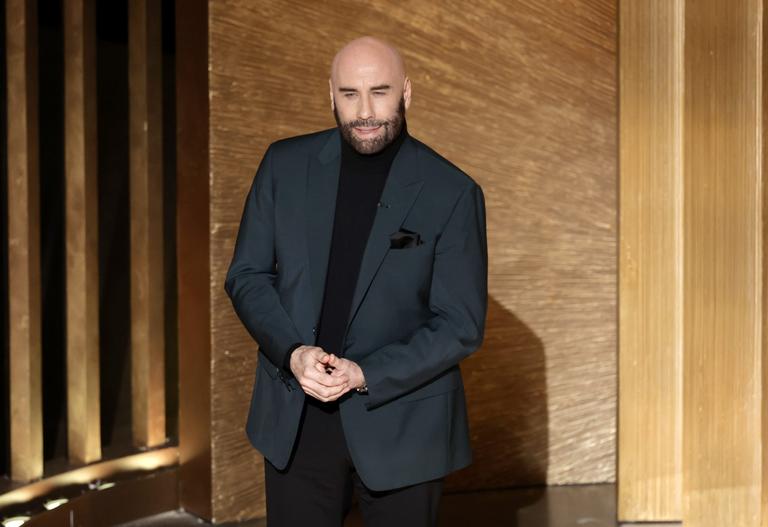 John Travolta breaks down in tears during Oscar tribute to Olivia Newton-John John Travolta breaks down in tears during Oscar tribute to Olivia Newton-John