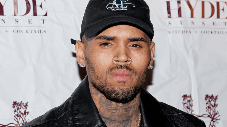 Chris Brown charged after being arrested in Manchester Chris Brown charged after being arrested in Manchester