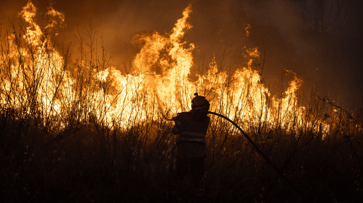 Thousands evacuated and at least one dead as nightmare wildfires sweep Europe